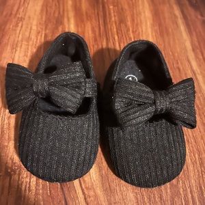 Black bow Mary Jane flats